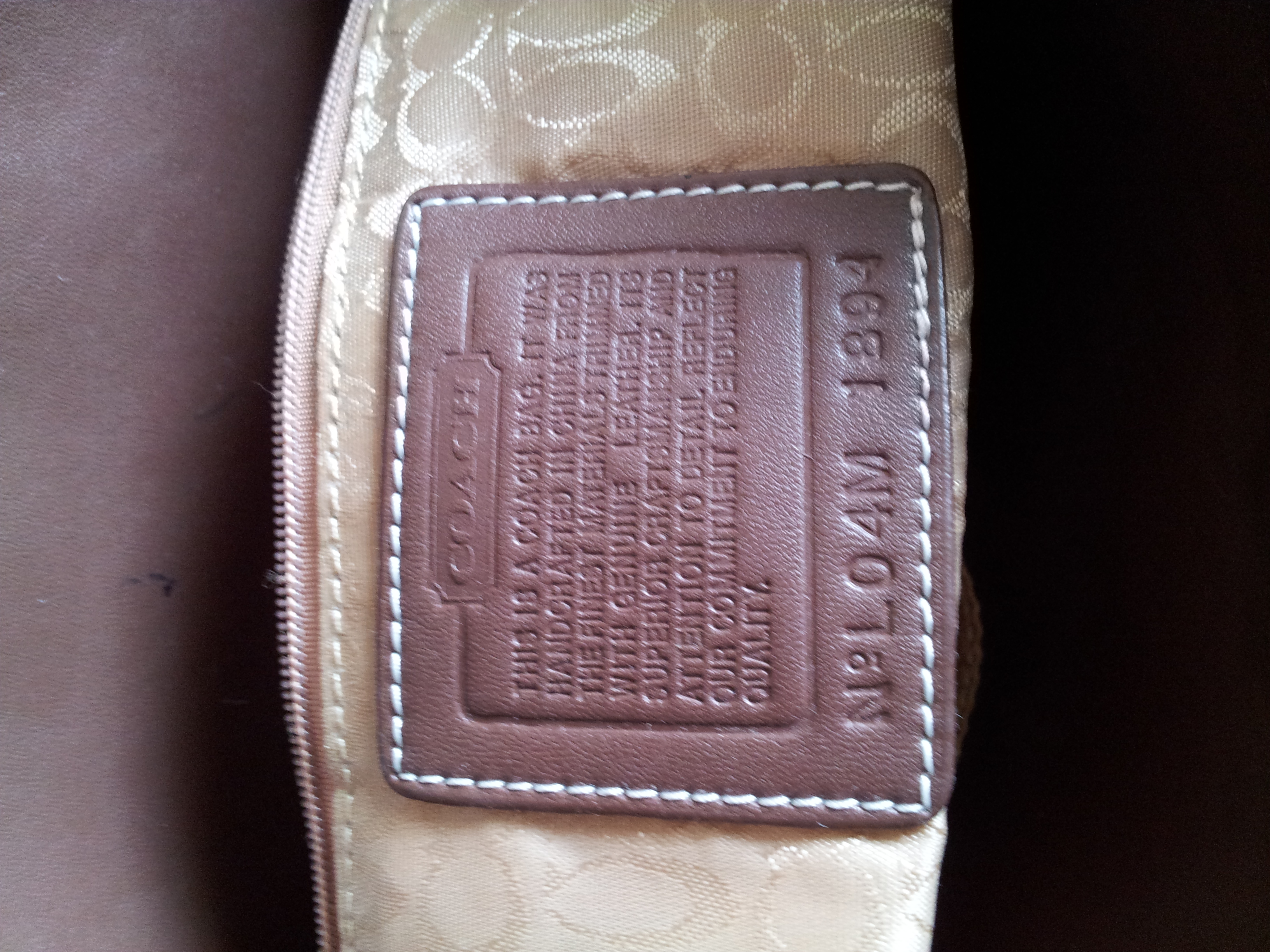 do coach purses have serial numbers
